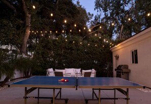 Ping pong table, fire pit and lounge area with BBQ grill