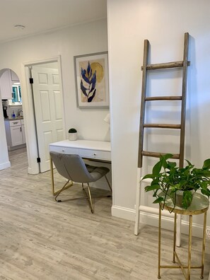 Beautifully decorated Livingroom with dedicated desk workstation