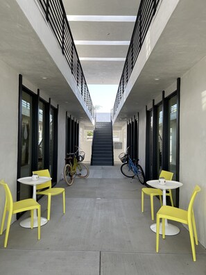 Downstairs courtyard. Apartments upstairs