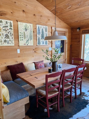 Banquette in sunroom perfect for family dinners