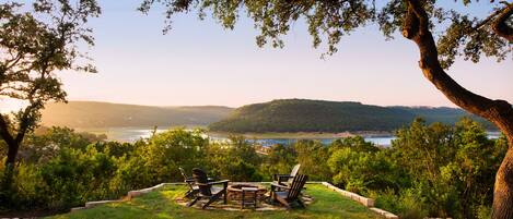 Front yard, fire pit, and Lake Travis. 
