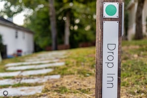 Park by the trail sign and follow the walkway.