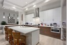 Gleaming top tier appliances in this fully equipped kitchen - a chef’s delight!