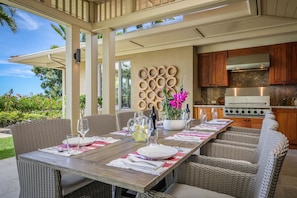 Stylish and modern al fresco dining with ocean views, BBQ grill.