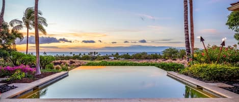 Luxury meets serenity, the view from your private pool in paradise.