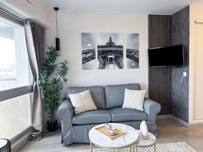Relax in the comfortable living room with a stylish sofa