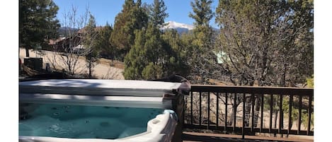 Large jacuzzi hot tub seats 5-6 with views of Sierra Blanca and Ruidoso Village