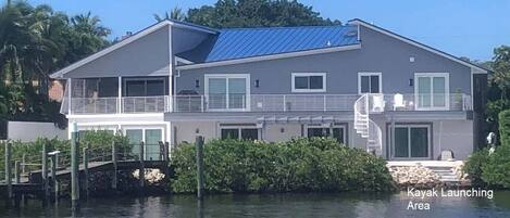 Front of house directly on Lemon Bay with dock an boat slip for boat up to 36 ft