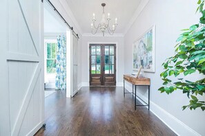 The beautiful foyer sets the tone for this modern, charming residence
