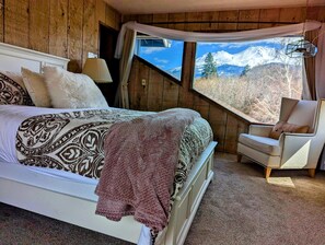 The Upstairs "Air Room" boasts an Architectural Window with a breath-taking view of Mount Shasta. The Queen Size bed offers extra height with a conventional boxspring and bedframe.