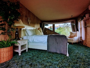 The Upstairs "Air Room" boasts an Architectural Window with a breath-taking view of Mount Shasta. The Queen Size bed offers extra height with a conventional boxspring and bedframe.