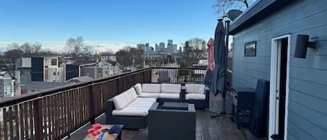 Large Rooftop Deck with Unobstructed Downtown View, Firepit, Sun & Lounge Chairs