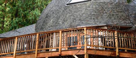 majestic roofline, and spacious deck with views