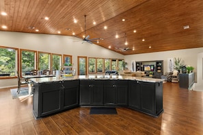 Spacious open-concept living. Modern kitchen island. Great room for gathering.