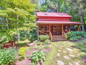 View of the front yard with sitting area and the front porch with rockers!