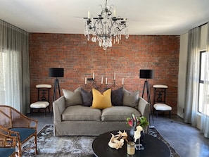 Living Room with featured brick wall