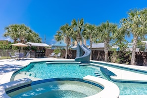 Custom Built Pool with lazy river, hot tub, swim up bar area & walk over bridge with water fall.