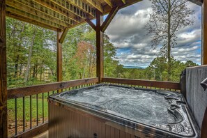 Take in the mountain view from the rejuvenating hot tub!