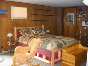 Queen size log bed.