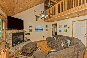 Enjoy hanging out on the comfortable sofa and stream your favorite shows on the large flat screen TV. The gas log fireplace offers ambiance during the cold months.