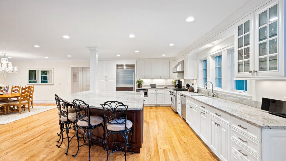 Classic East Hampton shingle-style home, lush acreage, private pool,…