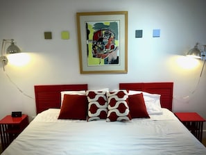 Solid mahogany bed, premium linens, at Rio Concho, Marfa House