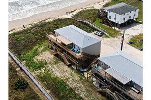 Closest building to the beach.  Unit is top right.