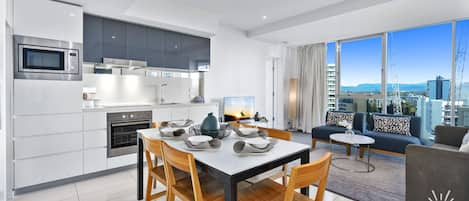 Sophisticated dining area is right next to the kitchen and the living area