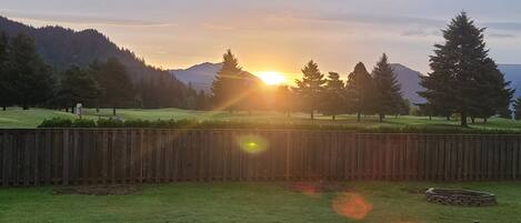 Sunrise over golf course from backyard.