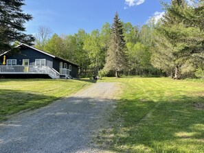 Front view with driveway, with plenty of room for cars.
