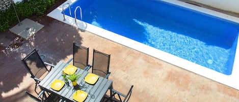 Water, Property, Blue, Swimming Pool, Table, Rectangle, Shade, Chair, Plant