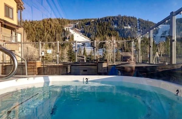 2 Hot tubs with mountain views!  Literally across from lift!