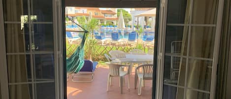 View to the ground terrace with pool access