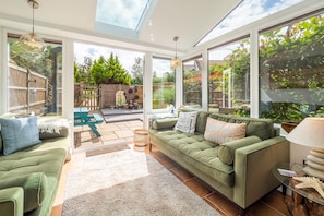 Roof Top View, Wells-next-the-Sea: The conservatory overlooks the garden