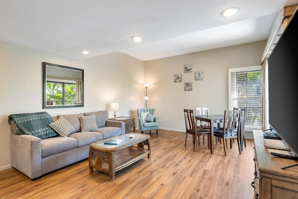 The living room has a queen sleeper sofa