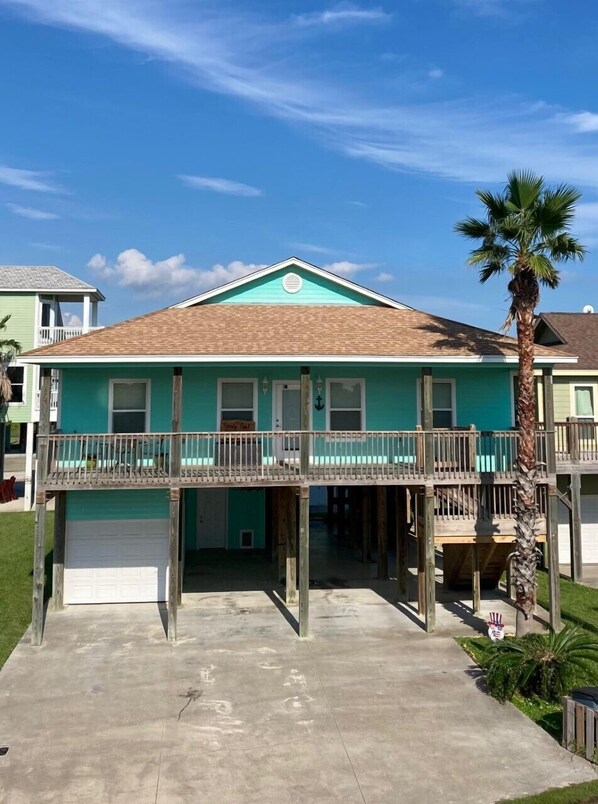 Front of house with multi-car parking