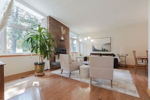 Lots of natural light and wood burning fireplace