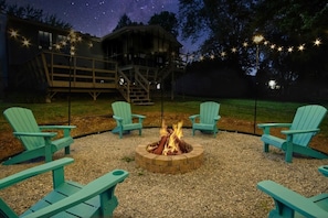 Memorable moments await here under magical lights around fire pit 