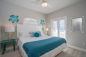 The Turquoise Sea Room has a king bed and direct access to the second floor deck