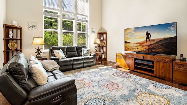 Living area with 75-inch flat screen TV with Cable and streaming