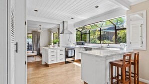 Spacious kitchen with breakfast bar