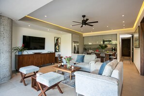 Living Room and kitchen view from the terrace.