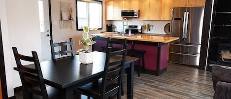 Open concept kitchen and dining room