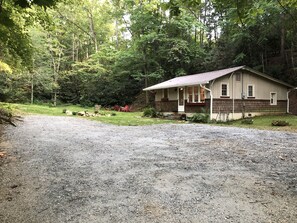 Room for 3-4 vehicles. Also corn hole, bocce ball is fun on the flat driveway.
