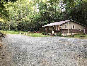 Room for 3-4 vehicles. Also corn hole, bocce ball is fun on the flat driveway.