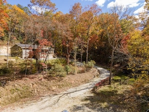 Over 3 private acre property is fully fenced in and ready for your next vacation. The little shed on the right side of the image is also part of the property. No neighbors in sight.