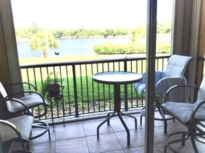 Private, screened in lanai, with lake views. Private and quiet.