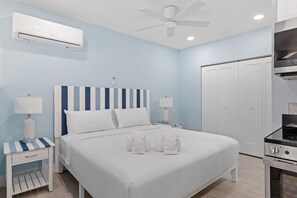 Captain Ed's Cottage- Gorgeous Residence at Palmview Inn of Sanibel featuring a king bed and queen sleeper sofa with memory foam mattress, in addition to a large bathroom with walk in shower and fully equipped kitchen