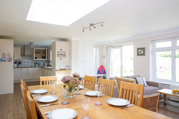 There’s room for everyone to sit together at the large dining table.