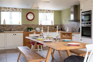 The large Kitchen is perfect for entertaining and our kitchen table can comfortably seat 10.